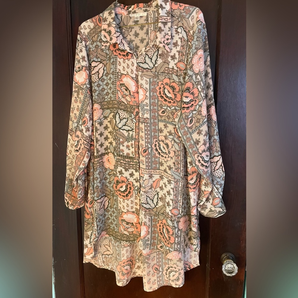 Women’s tunic blouse in peach, blue, and green